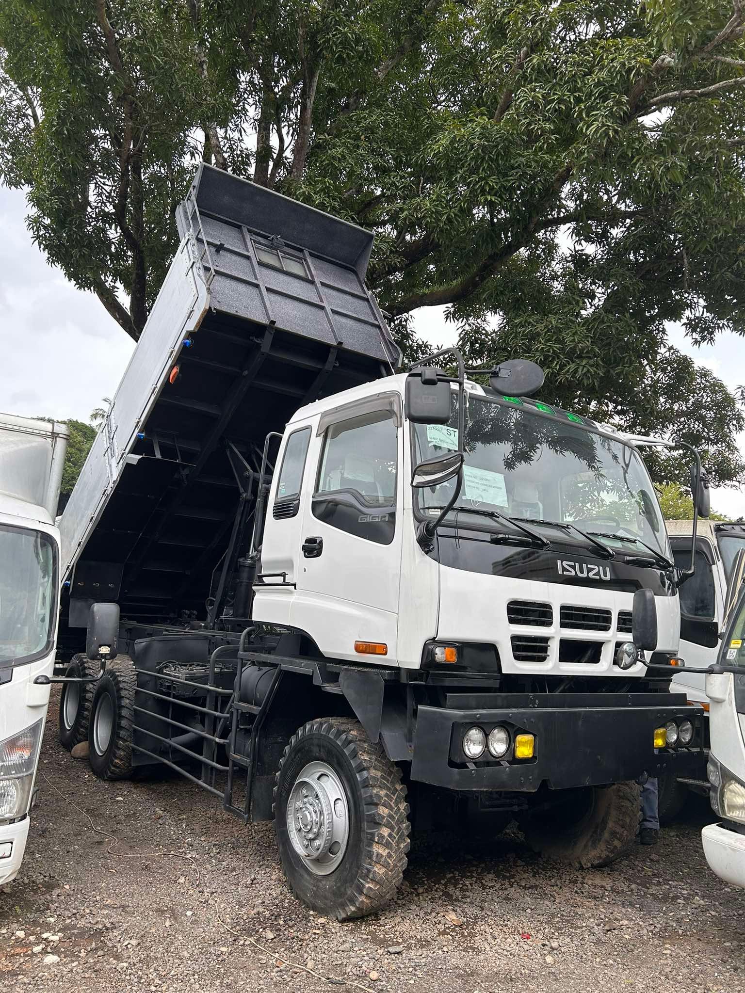 Isuzu and Fuso Dump Trucks – front view