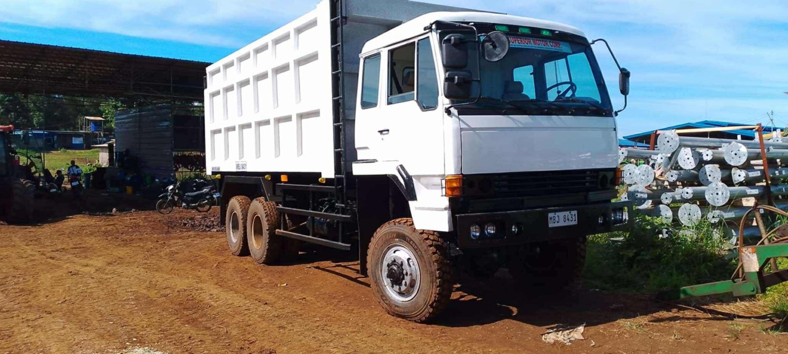 Isuzu and Fuso Dump Trucks – front view
